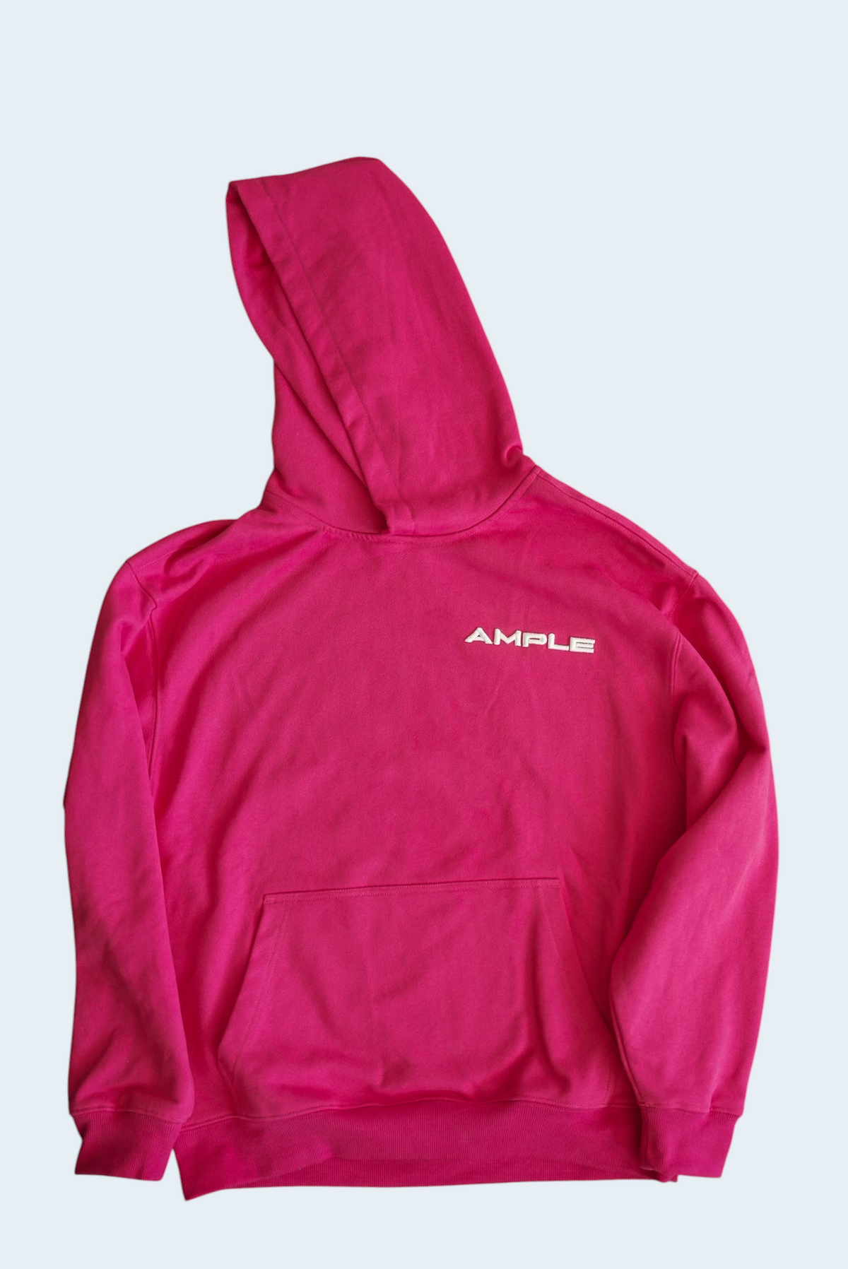 AMPLE unisex long sleeve hoodie in bright pink French terry cotton with white brand logo on the chest