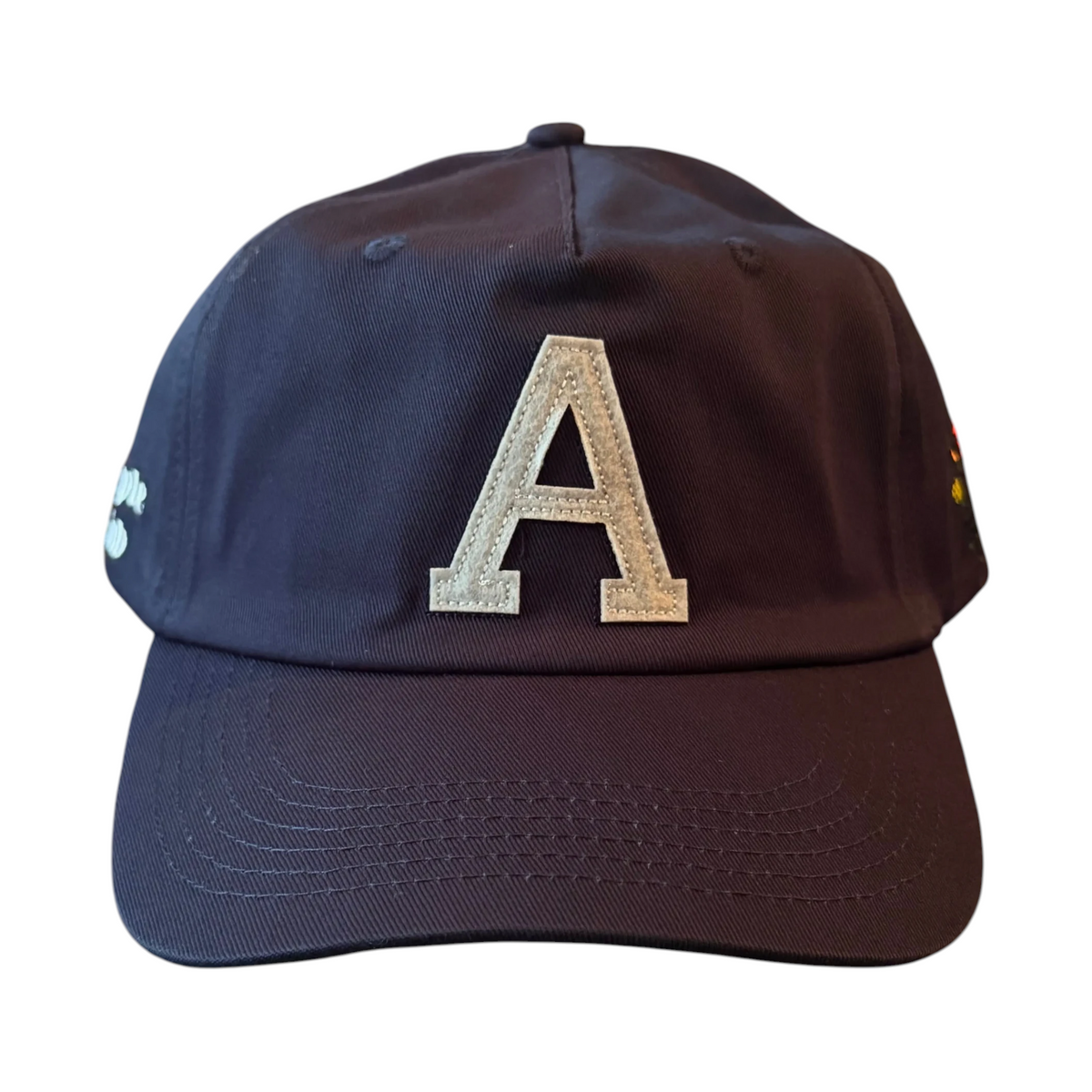 AMPLE navy blue cotton twill baseball cap featuring a white embroidered A patch and side logo detailing.